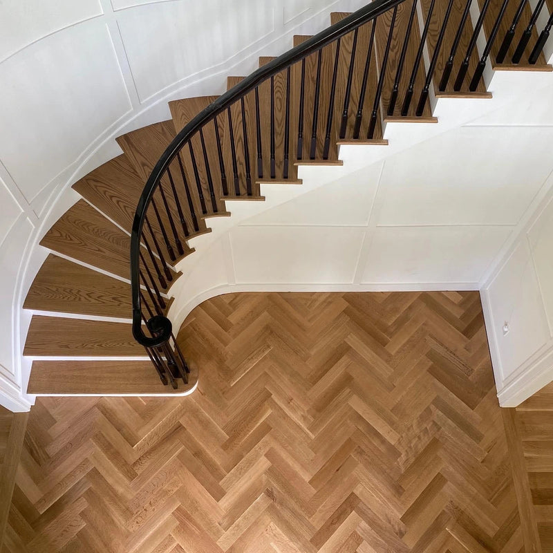 Stair treads sanded to bare wood